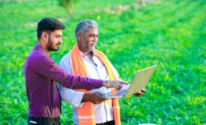 A Image of agronomist with farmer in field